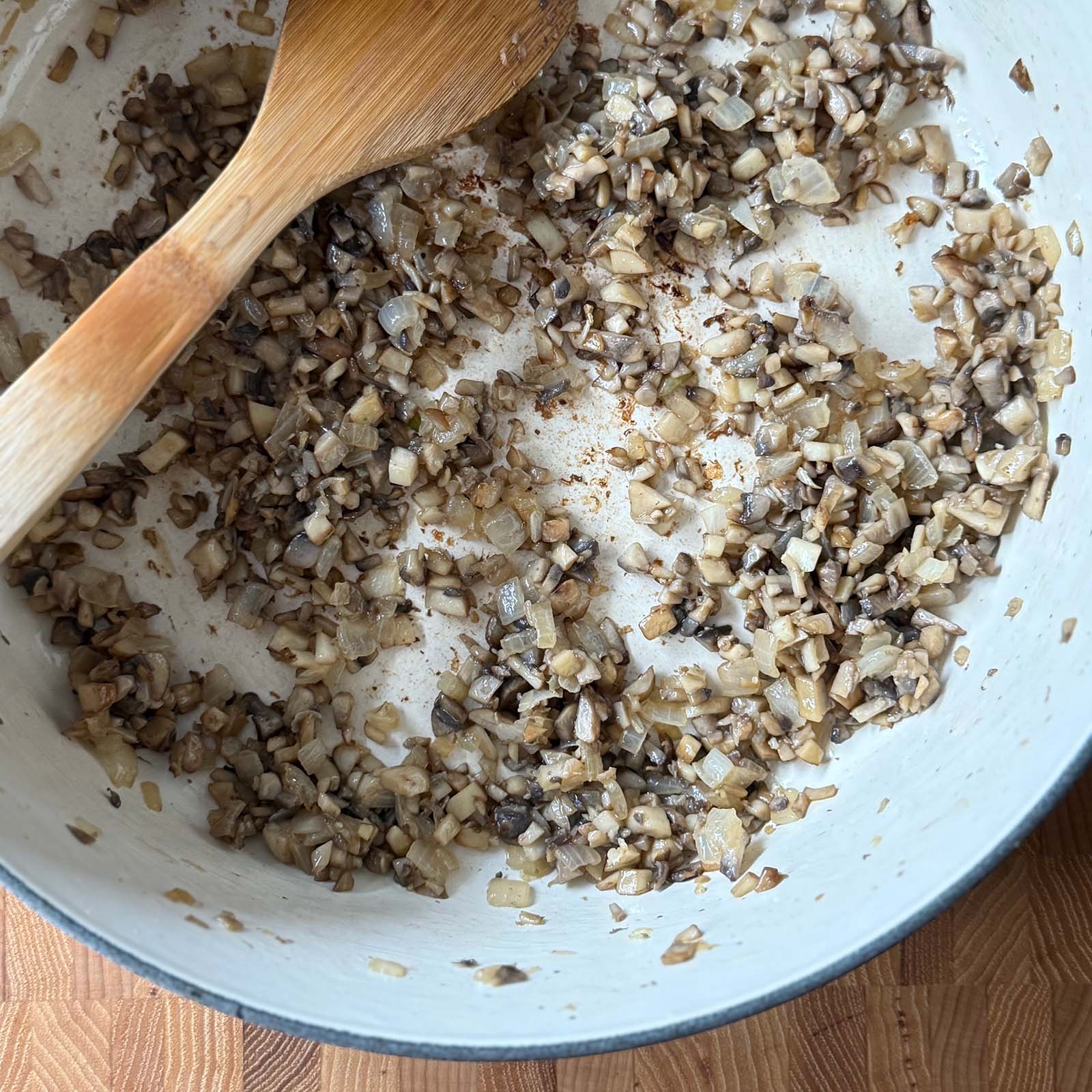 Cooked, Diced Mushrooms in a Large Pan