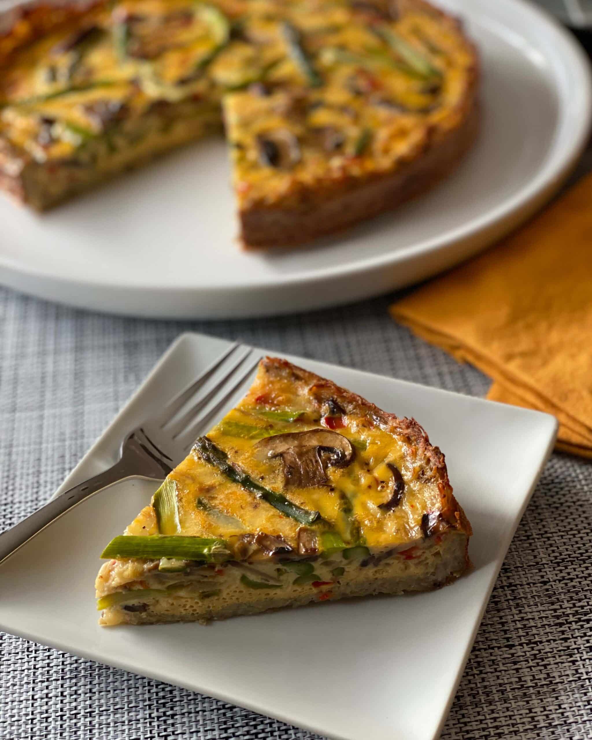 Slice of Hashbrown Crusted Asparagus Mushroom Quiche