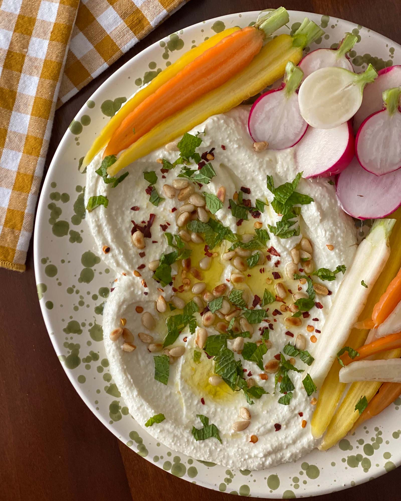 Whipped Feta Dip on a Platter with Carrots and Radishes