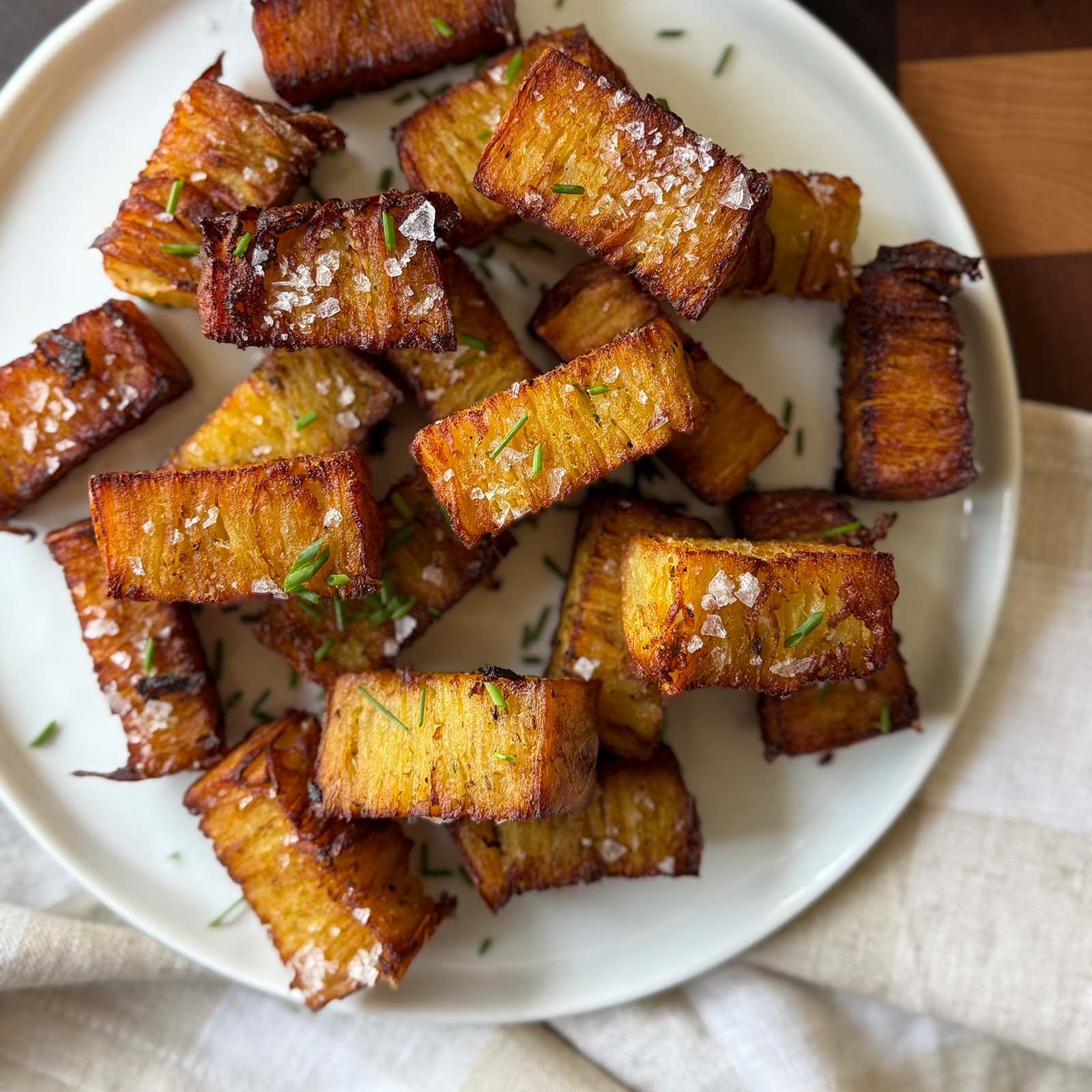 Potato Pave Stacked on a White Plate