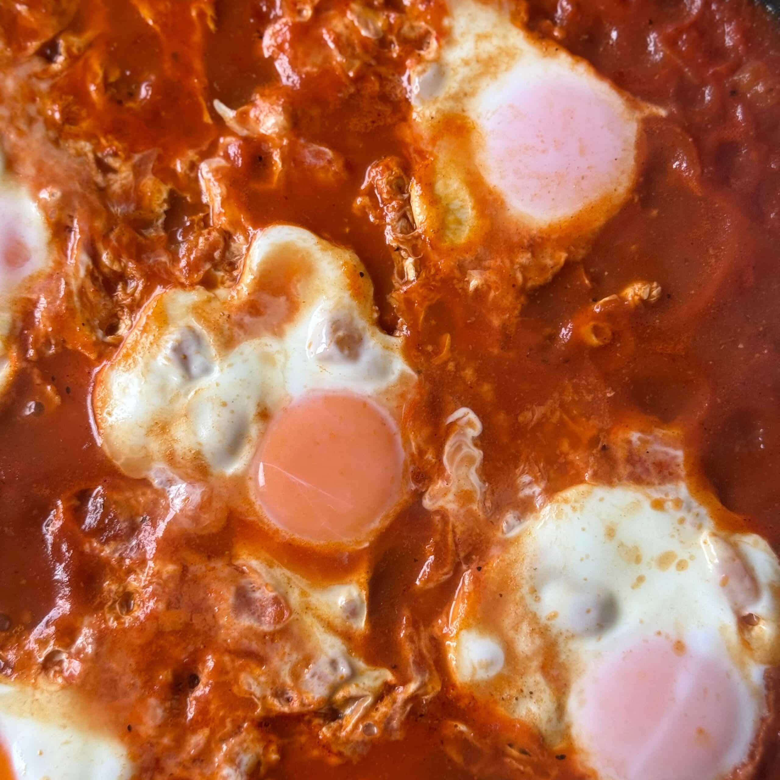 Eggs Poaching in Shakshuka