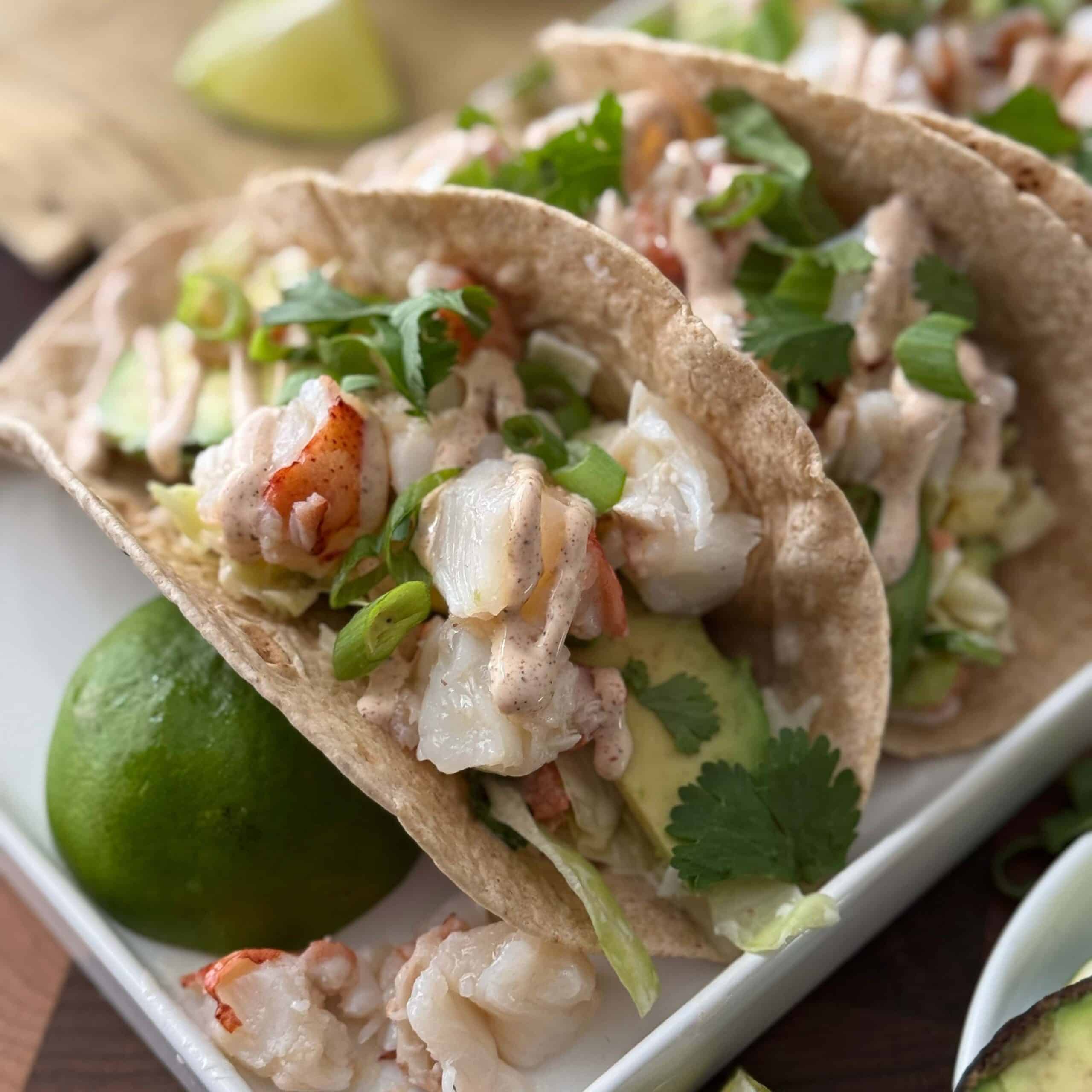 Lobster Tacos with Spicy Crema
