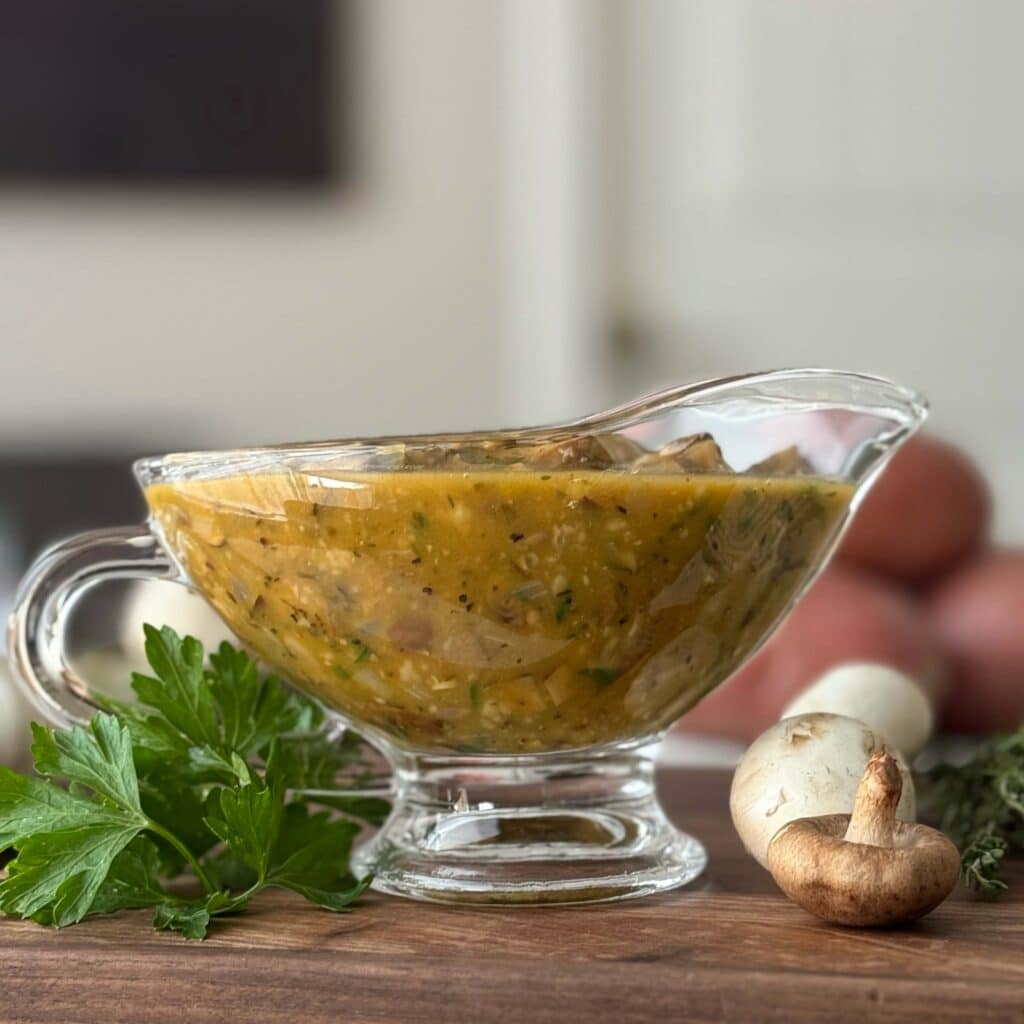Mushroom Gravy in a clear gravy boat