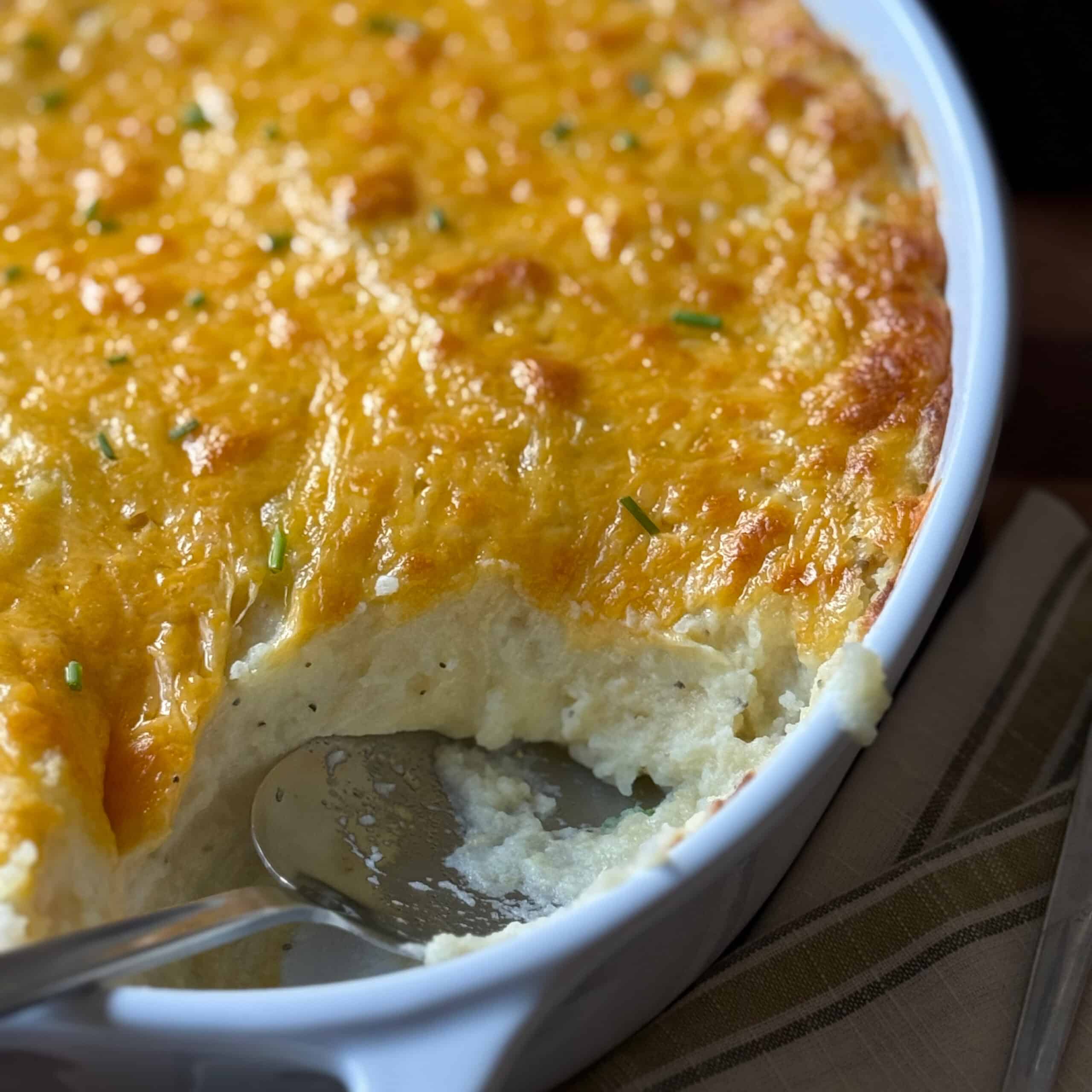 Cheesy Mashed Potatoes Casserole with Spoon