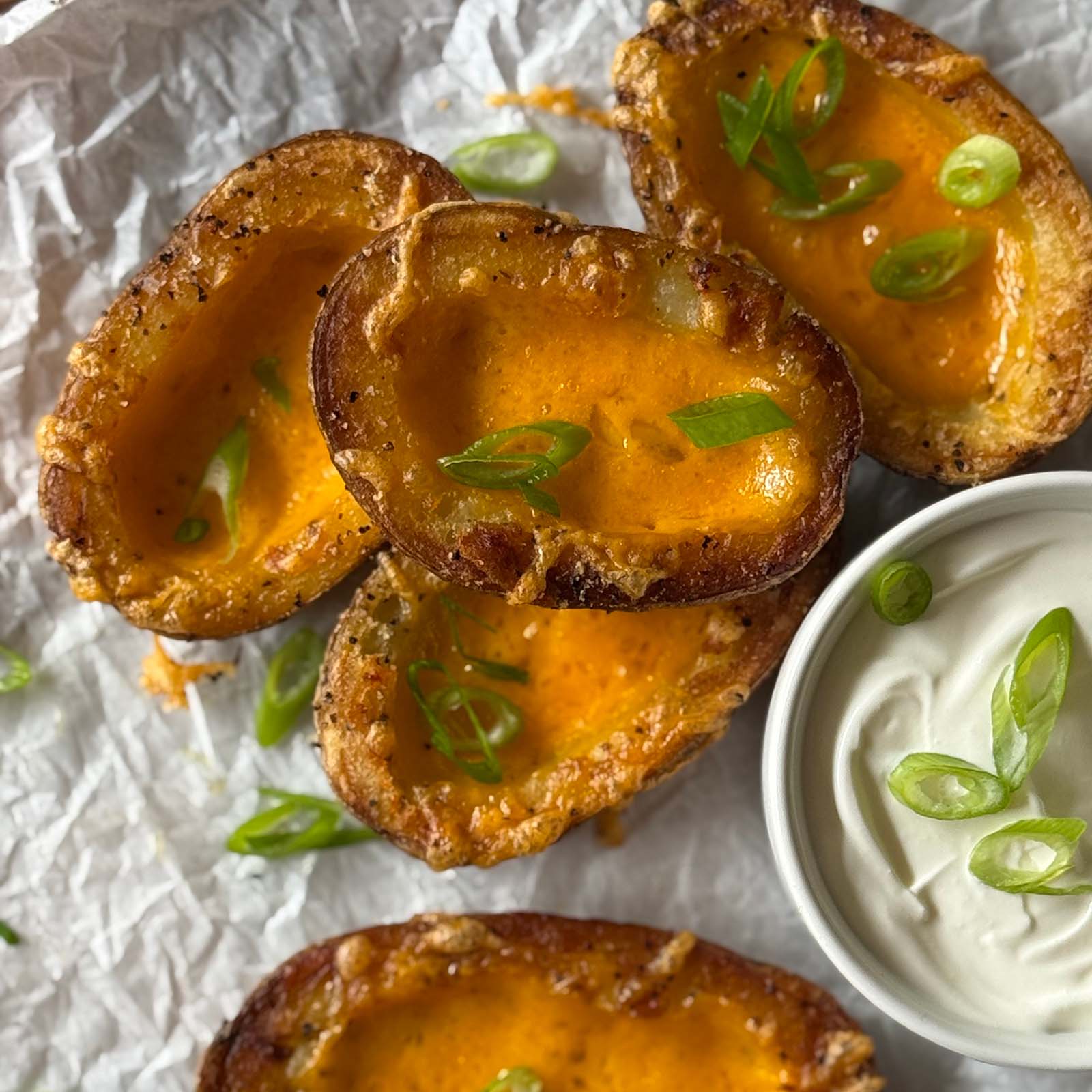 Cheesy Potato Skins with Sour Cream on the Side