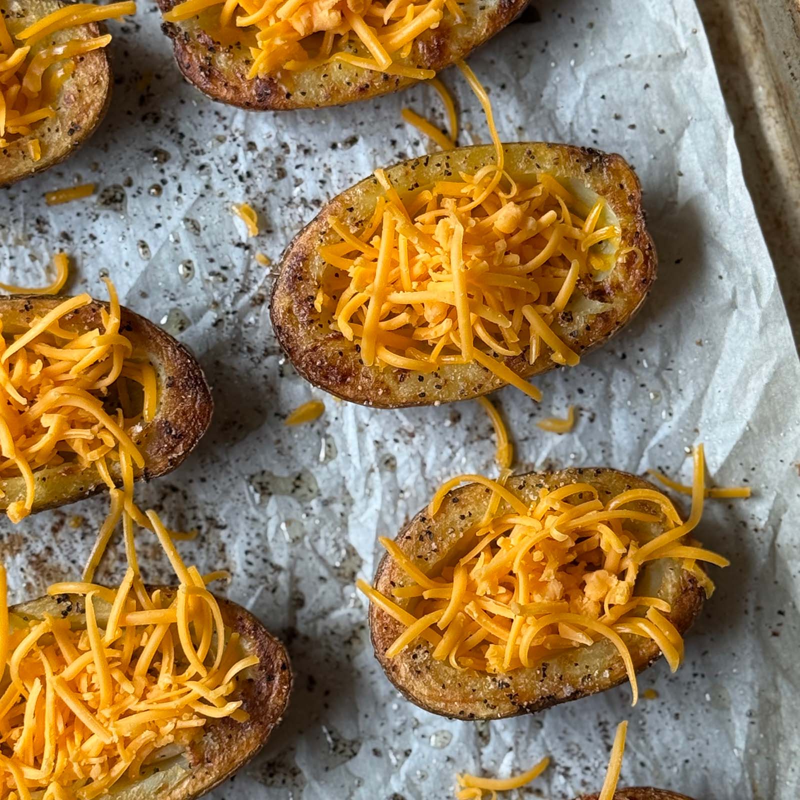 Potato Skins Topped with Shredded Cheese
