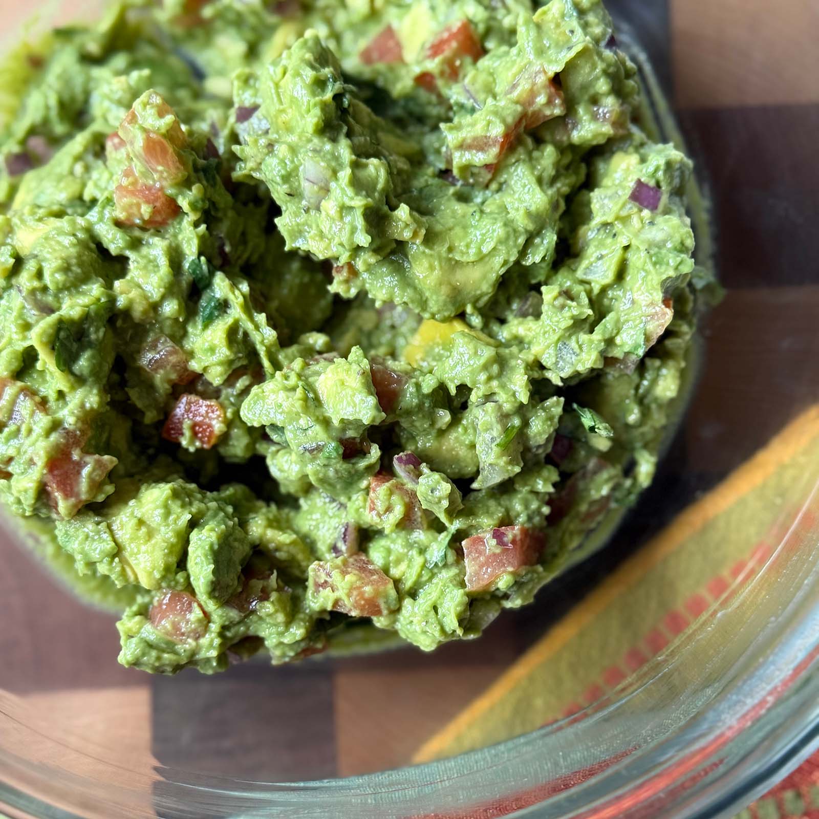 Chunky Guacamole Mixed in a Bowl