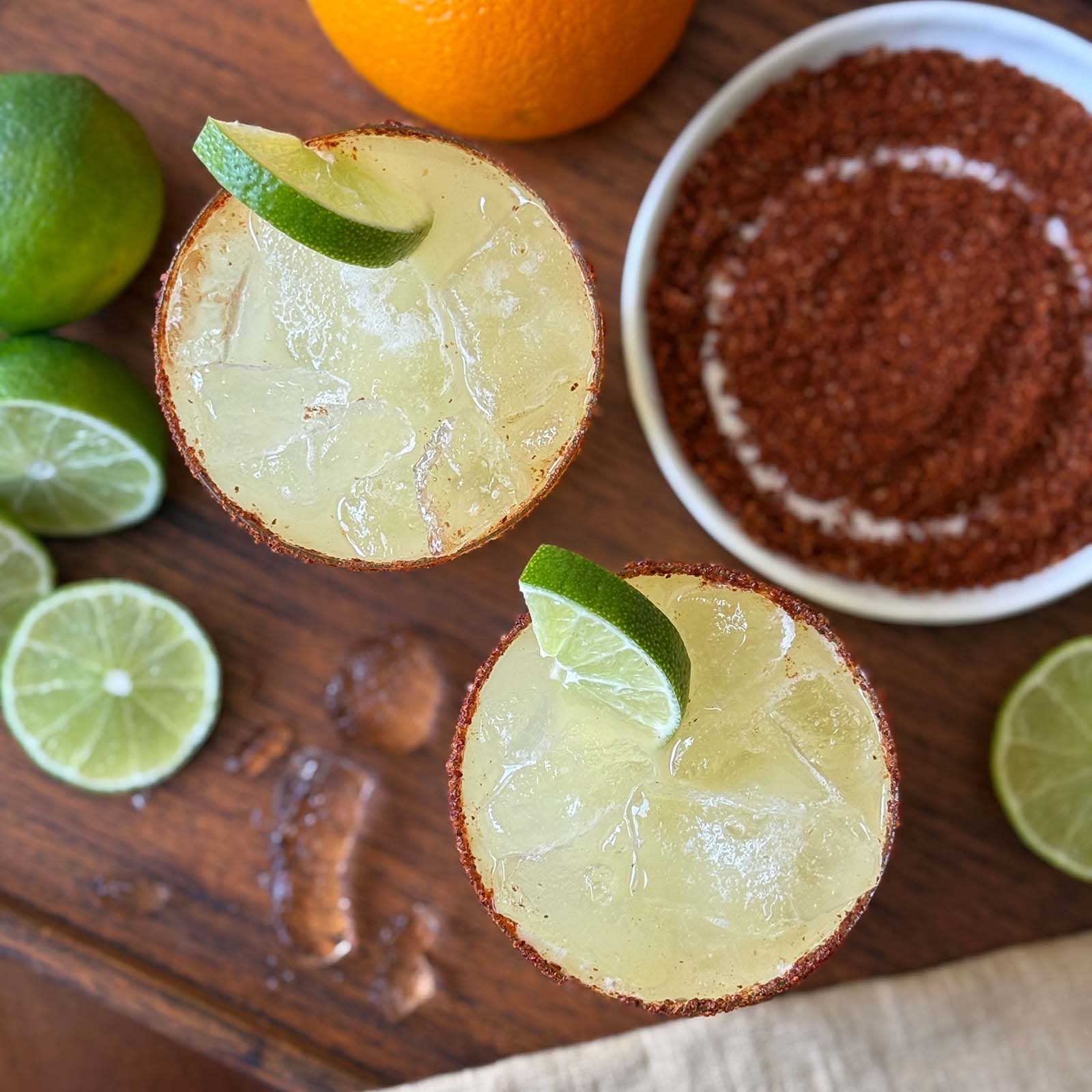 Margarita Mocktails on a Tray with Fruit and Tajin