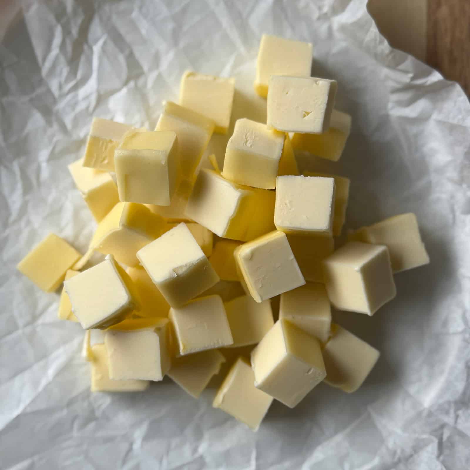 Cubed Butter on Parchment Paper